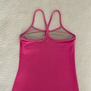 Lululemon pink tank top! Fits a size 4 or 6 in lululemon sizing